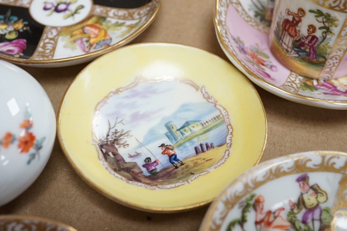 A group of 19th/20th century German porcelain, comprising a Nymphenburg pug, seven Dresden miniature cups and saucers and a Meissen bottle, largest 13cm high